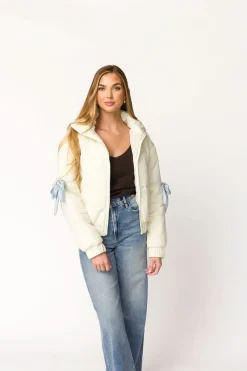 New Worth Collective Andy Bow Cropped Puffer Jacket in Bone