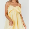 Discount Worth Collective Irelyn Babydoll Mini Dress with Bow Accent in Yellow