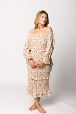 Fashion Worth Collective Lila Floral Printed Smocked Midi Dress in Pink - Bump Friendly