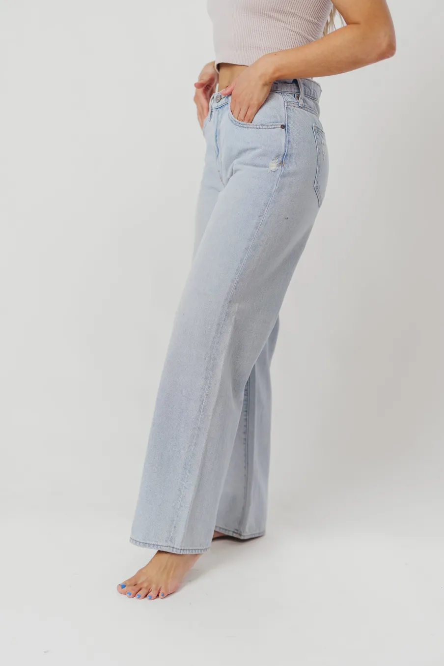 Fashion Worth Collective Nori Lightly Distressed Stretch Denim in Light Wash