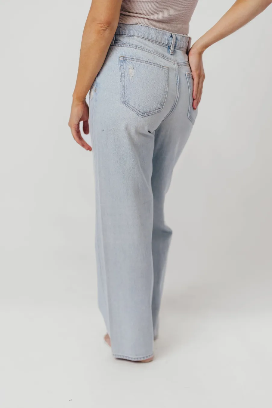 Fashion Worth Collective Nori Lightly Distressed Stretch Denim in Light Wash