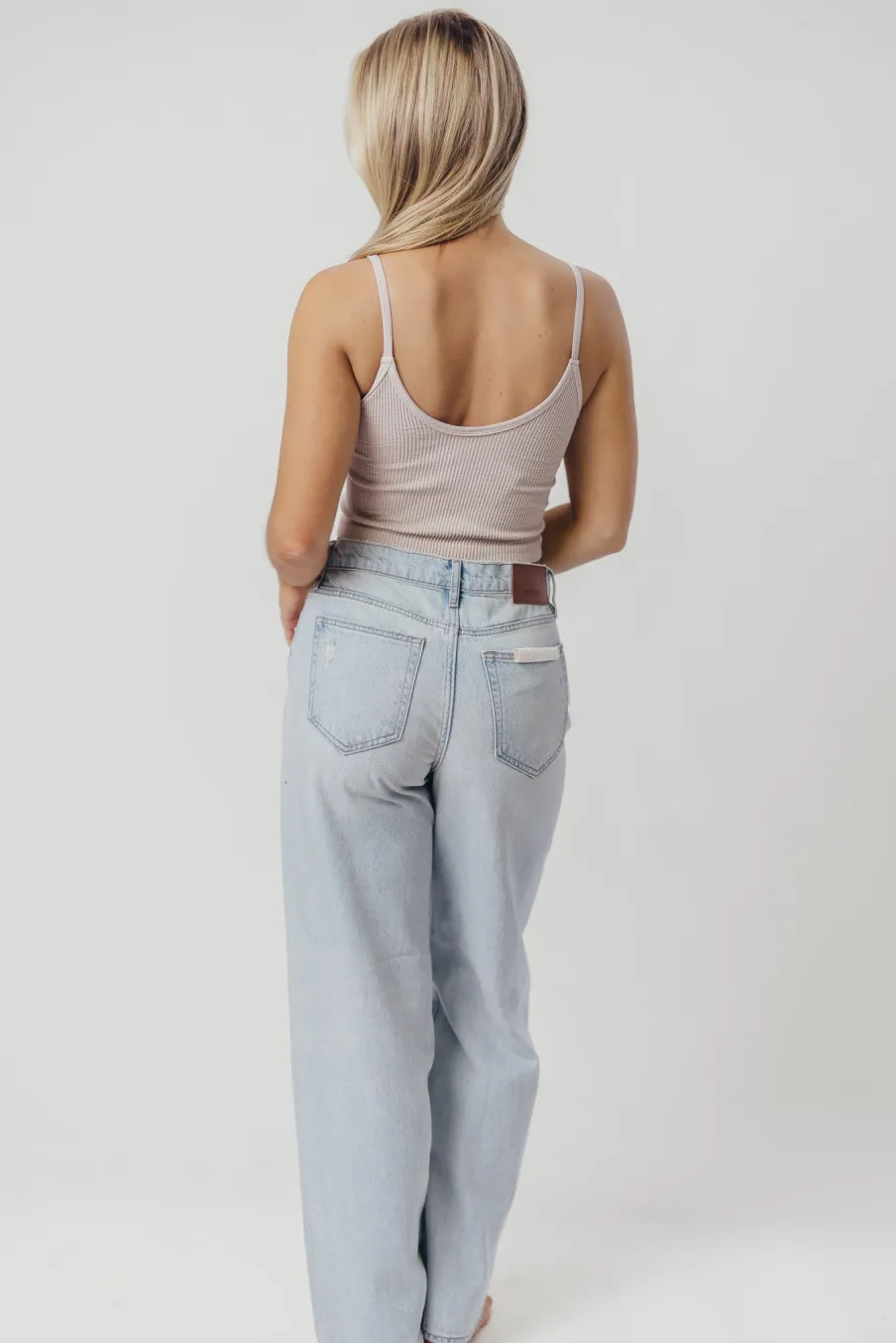 Fashion Worth Collective Nori Lightly Distressed Stretch Denim in Light Wash
