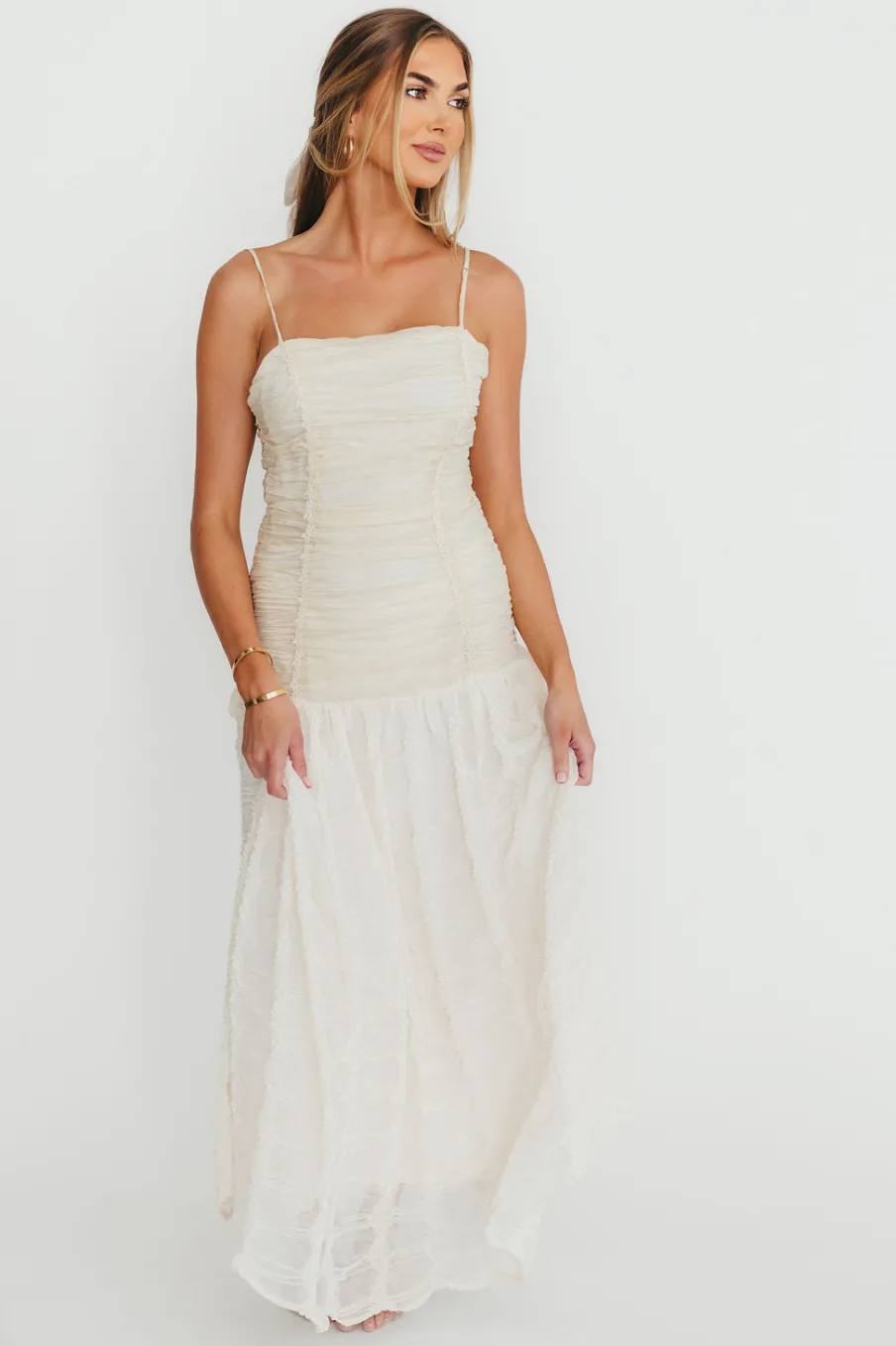 Fashion Worth Collective Rosie Ruched Maxi Dress With Bow Back Detail in Cream
